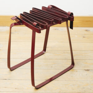 skinny hand-bent steel stool