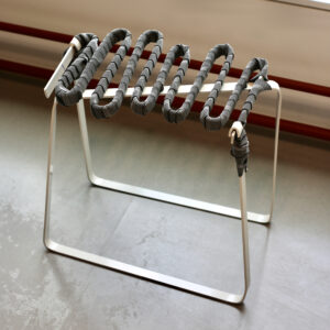 chunky hand-bent steel stool with wrapped seat